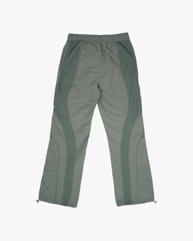 EPTM Era Pants in sage made from nylon ripstop with 3M reflective piping, elastic waistband, and relaxed fit