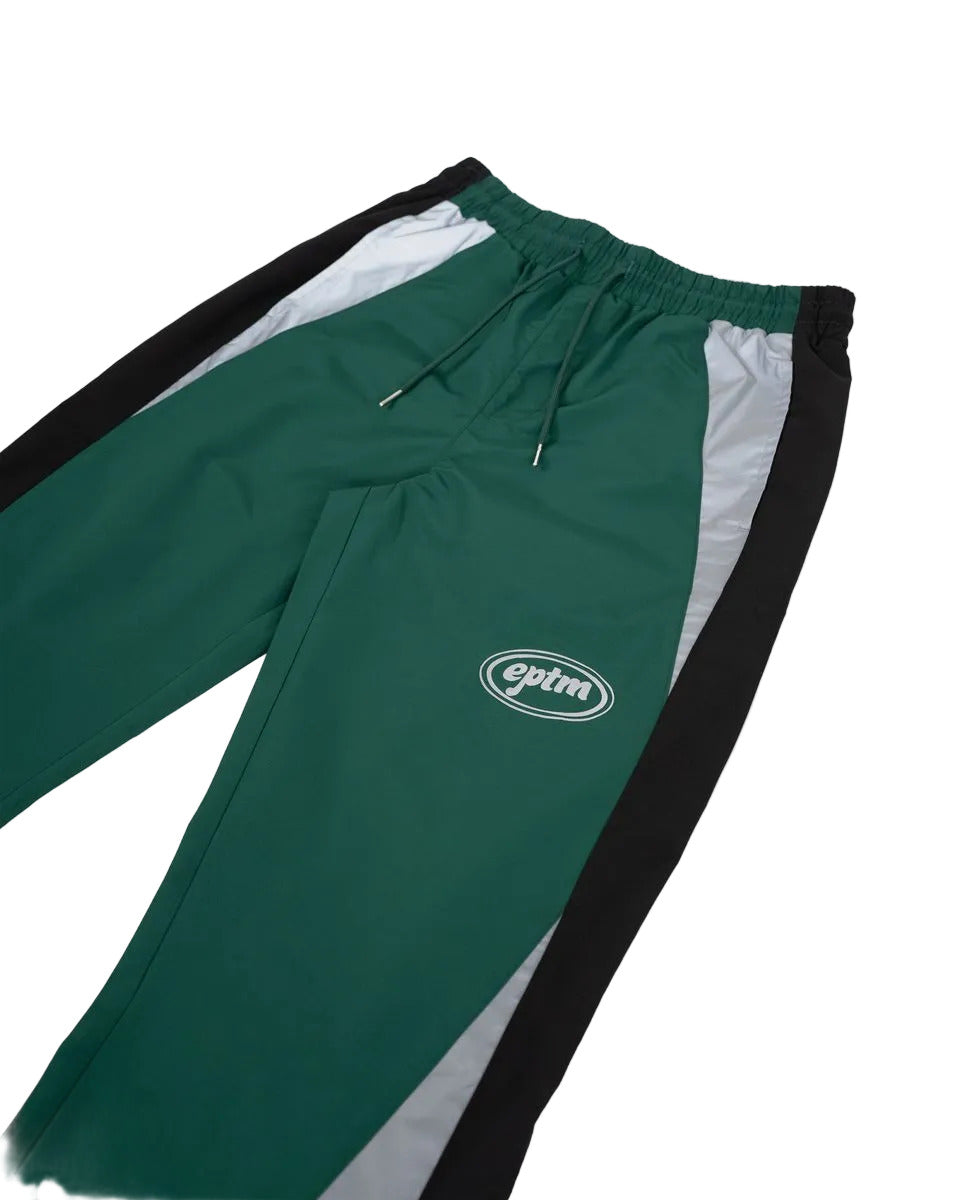 EPTM Oslo pants with reflective 3M accents, elastic waistband, and adjustable leg toggles in a relaxed streetwear fit