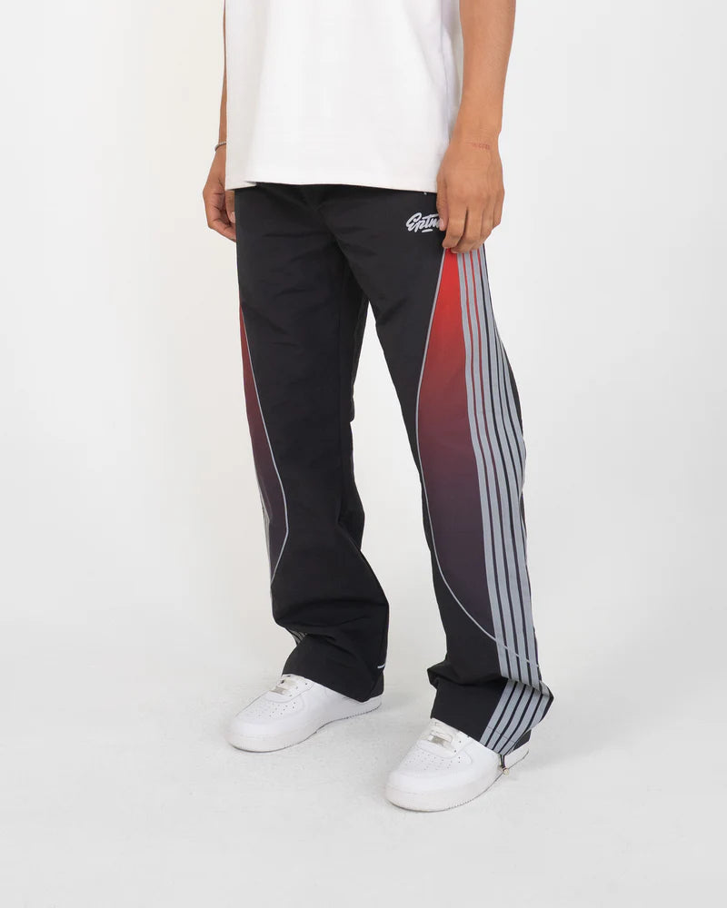 Solar Pants made from ripstop nylon with sun-inspired ombre panels, 3M reflective trims, elastic waistband, and relaxed fit