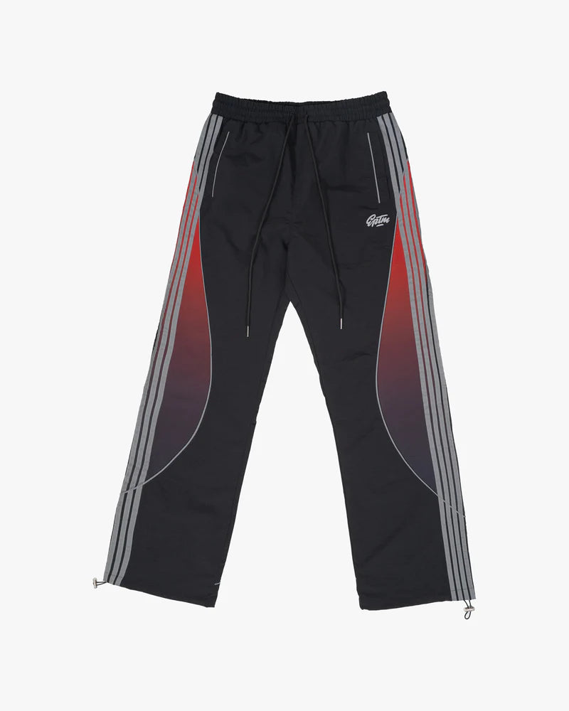 Solar Pants made from ripstop nylon with sun-inspired ombre panels, 3M reflective trims, elastic waistband, and relaxed fit