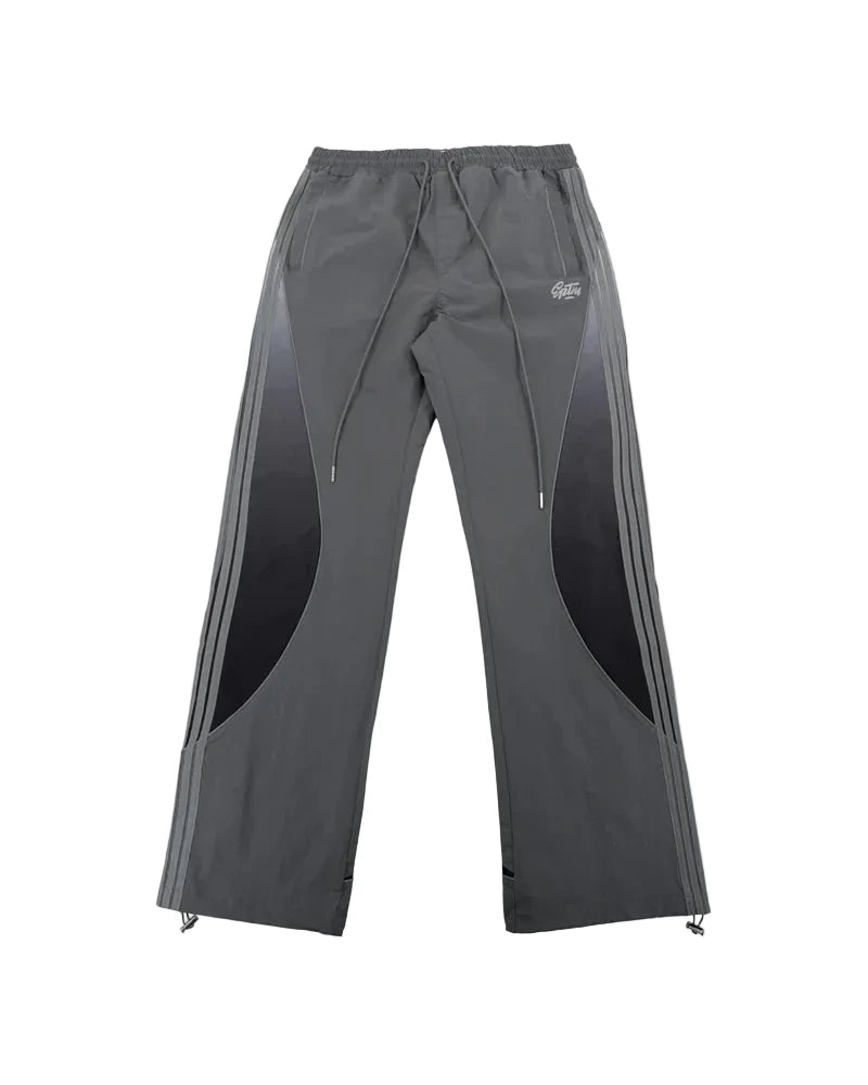 Solar Pants made from ripstop nylon with sun-inspired ombre panels, 3M reflective trims, elastic waistband, and relaxed fit