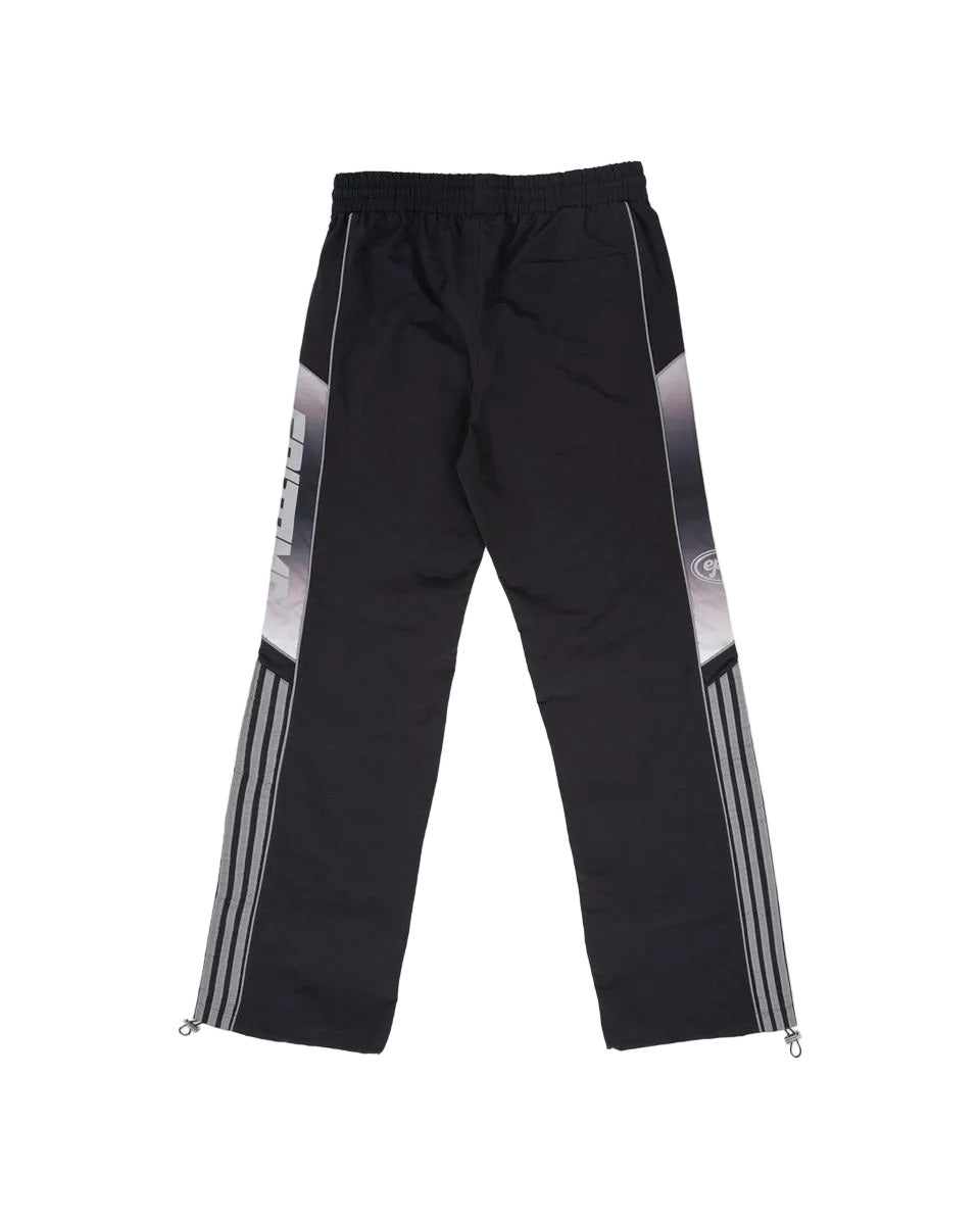 Eclipse pants with ripstop nylon construction, ombre panels, reflective 3M accents, elastic waistband with drawstring, and adjustable bottom toggles
