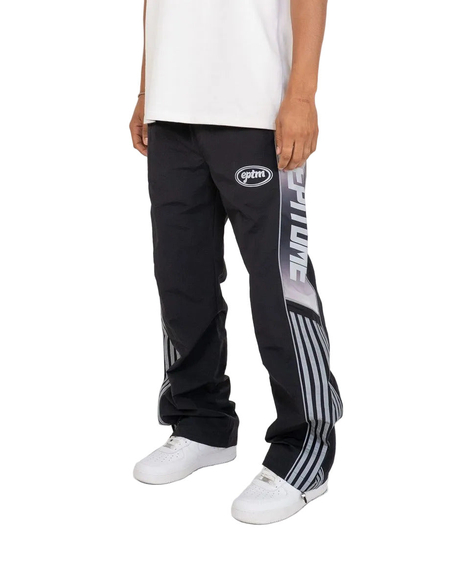 Eclipse pants with ripstop nylon construction, ombre panels, reflective 3M accents, elastic waistband with drawstring, and adjustable bottom toggles