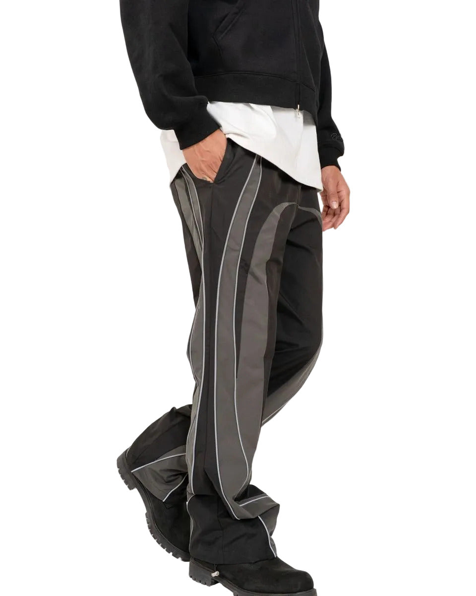EPTM UO black pants with nylon fabric, 3M reflective piping, elastic drawstring waistband, adjustable bottom toggles, and front welt pockets