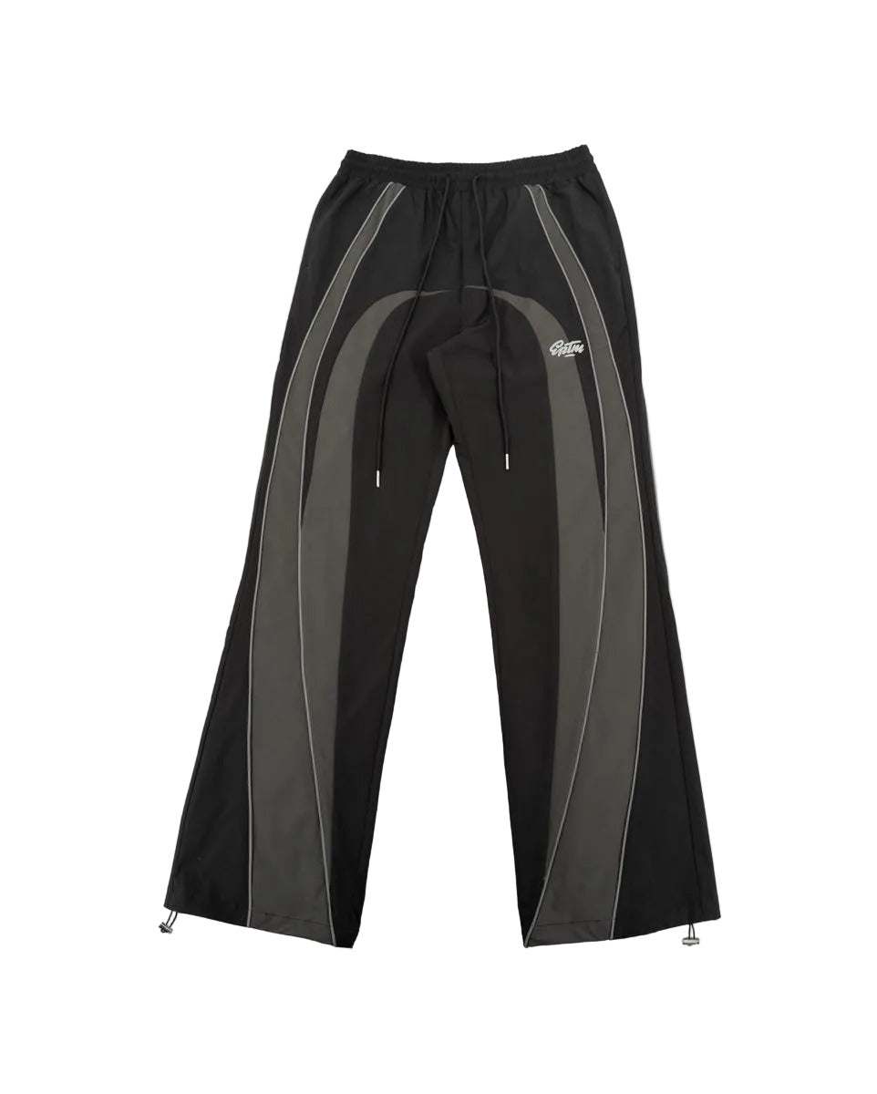 EPTM UO black pants with nylon fabric, 3M reflective piping, elastic drawstring waistband, adjustable bottom toggles, and front welt pockets