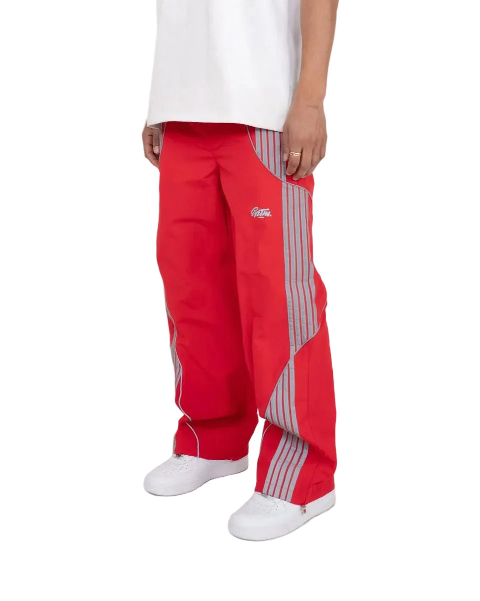 EPTM Pulse Pants with reflective 3M detailing, piping accents, elastic waistband, and adjustable leg toggles in relaxed streetwear fit