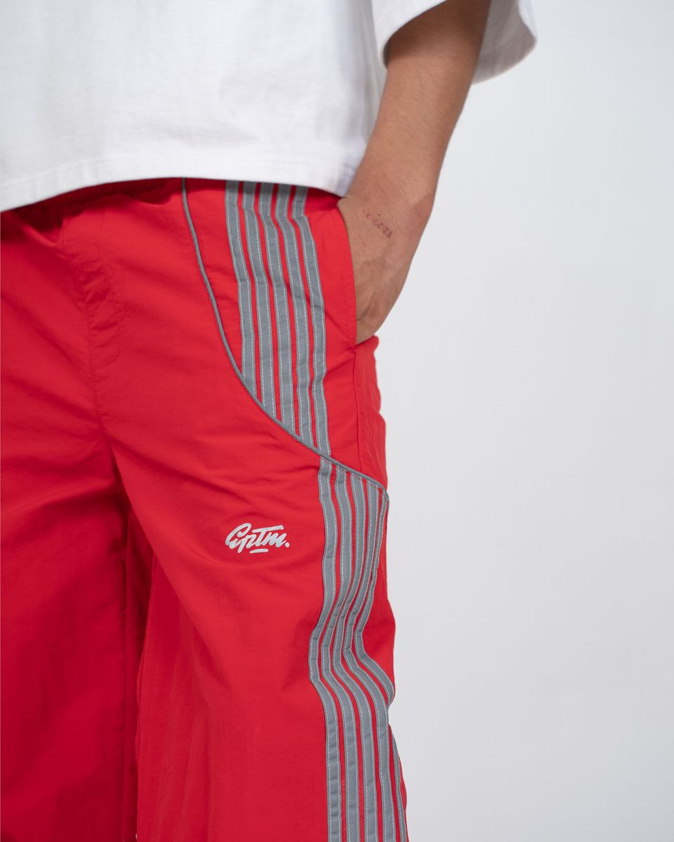EPTM Pulse Pants with reflective 3M detailing, piping accents, elastic waistband, and adjustable leg toggles in relaxed streetwear fit