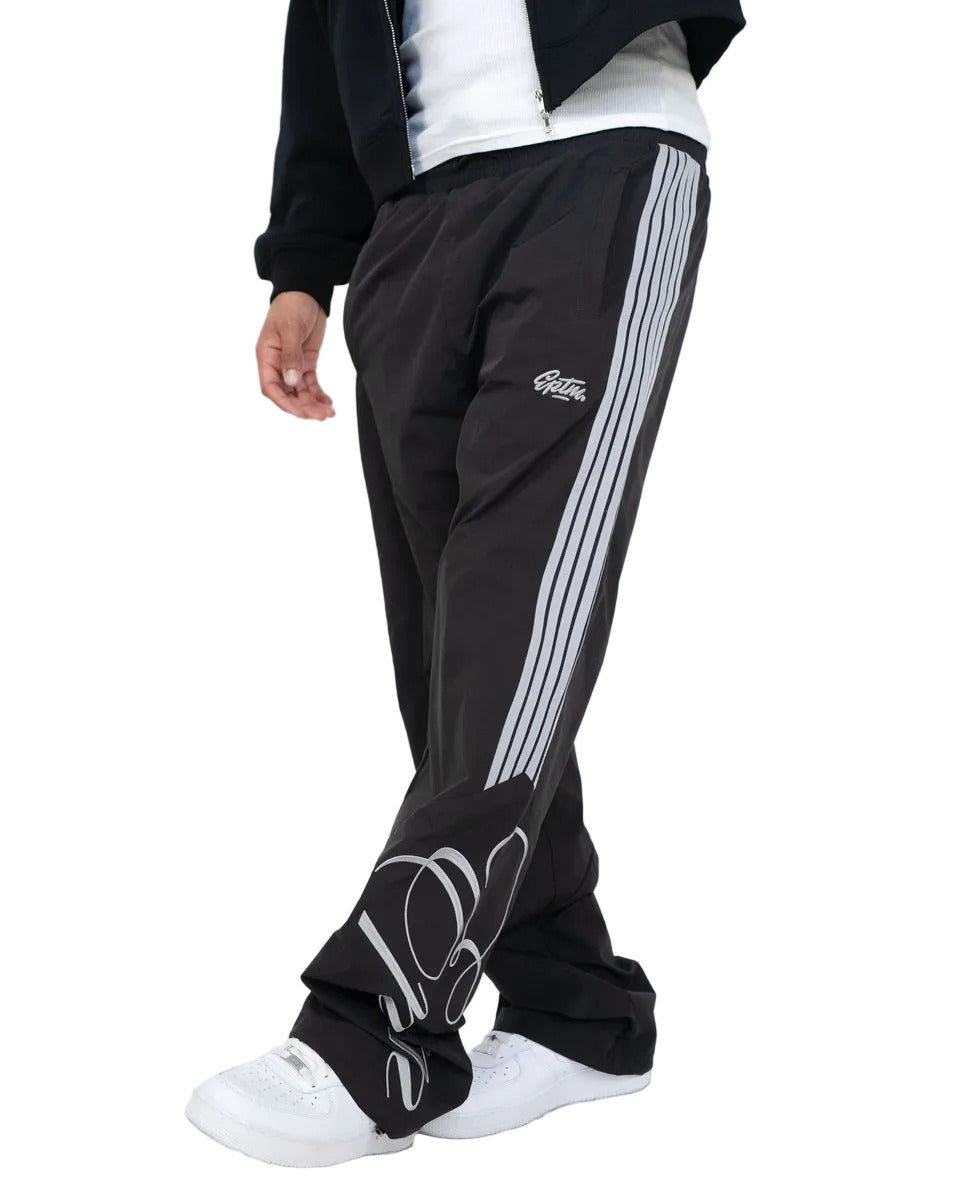 EPTM Kairo black pants with elastic waistband, adjustable cord and toggles, and front and back pockets