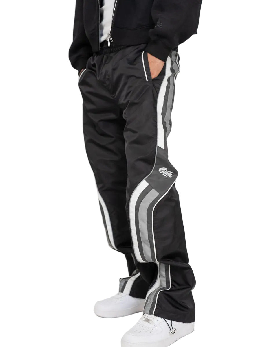 EPTM Maxx black pants with elastic waistband, adjustable cord and toggles, and front and back pockets