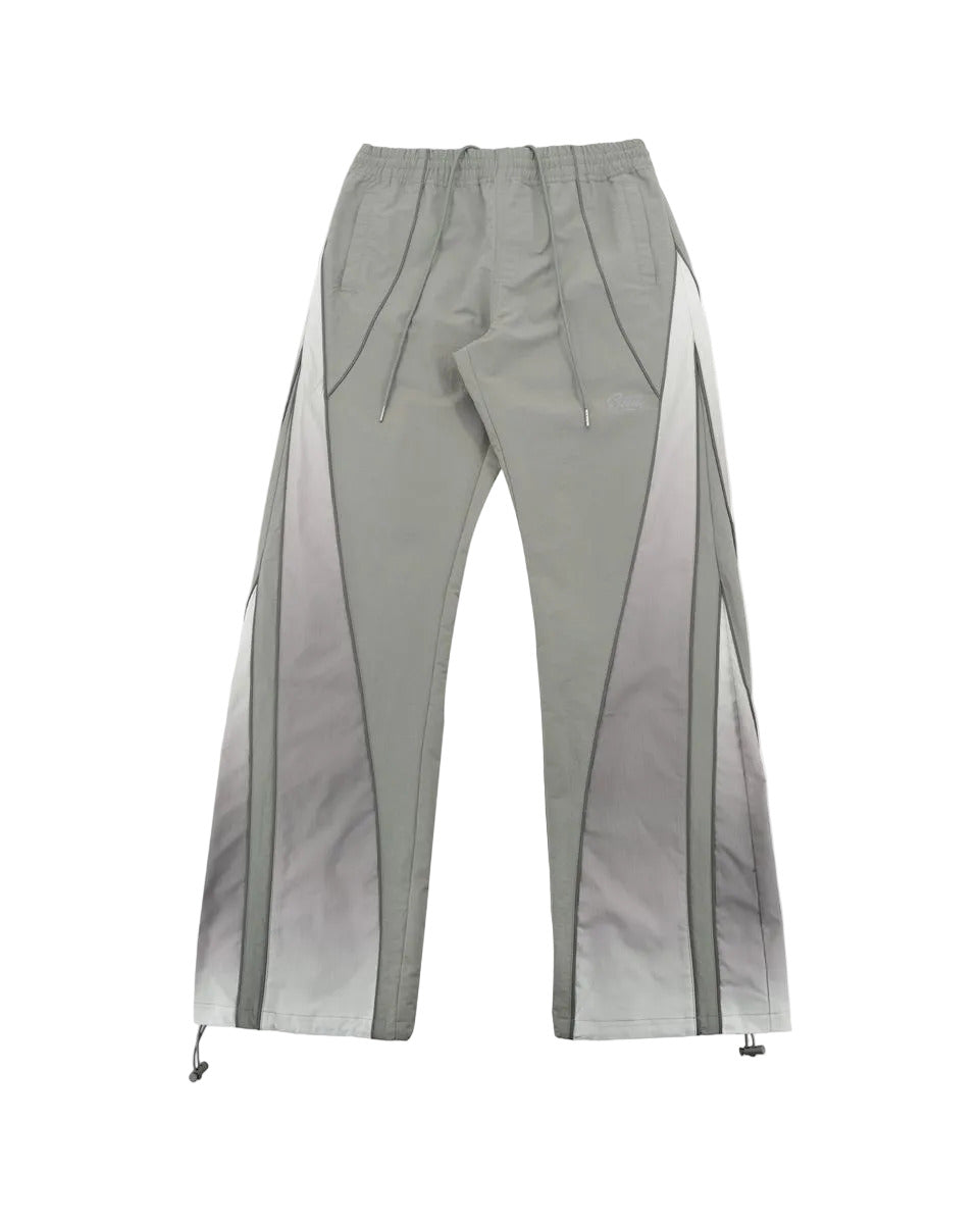 Laguna pants with ombré contrast panels, reflective piping, relaxed flare fit, and modern streetwear styling