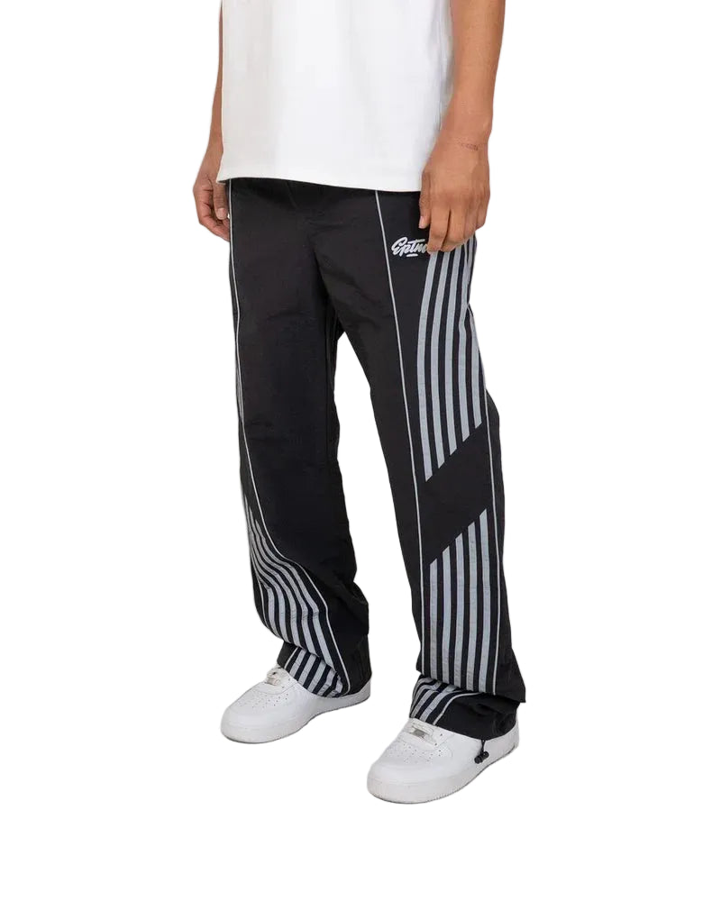 EPTM Roundy Pants with striped leg detailing, lightweight fabric, and modern athletic streetwear design