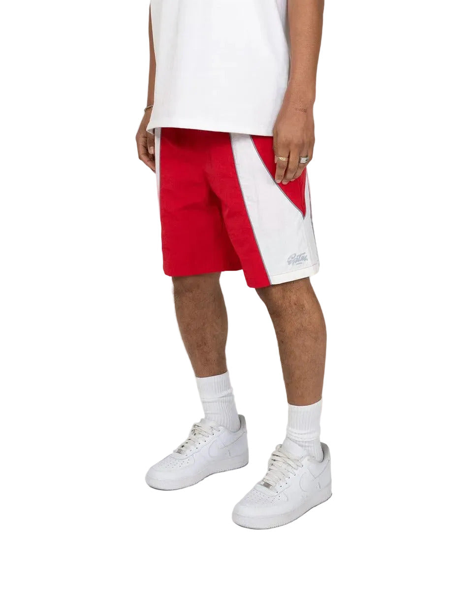 Mate shorts with reflective piping, elastic waistband, and lightweight nylon fabric in modern streetwear style