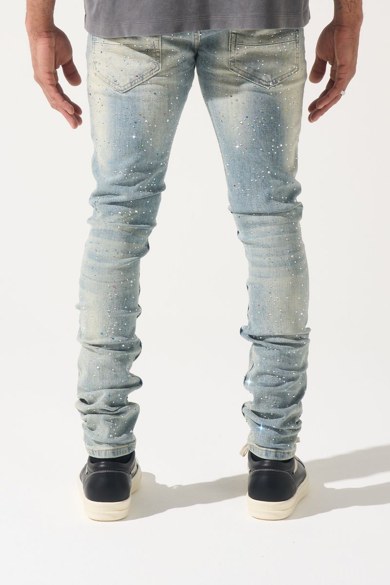 SERENEDE® Franchise fitted denim jeans in vintage earth blue wash with multi-colored hot-fix crystals and branded detailing.