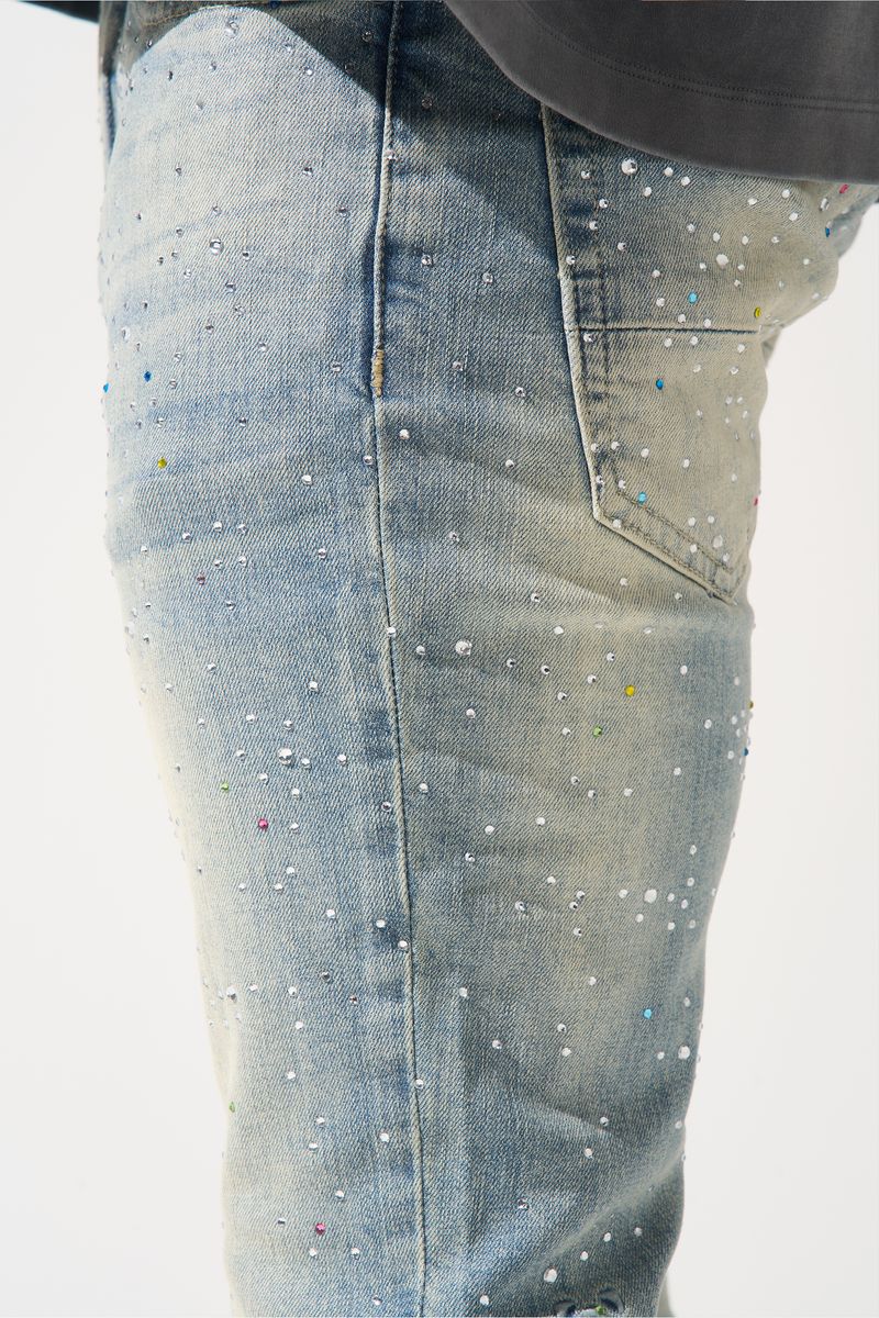 SERENEDE® Franchise fitted denim jeans in vintage earth blue wash with multi-colored hot-fix crystals and branded detailing.