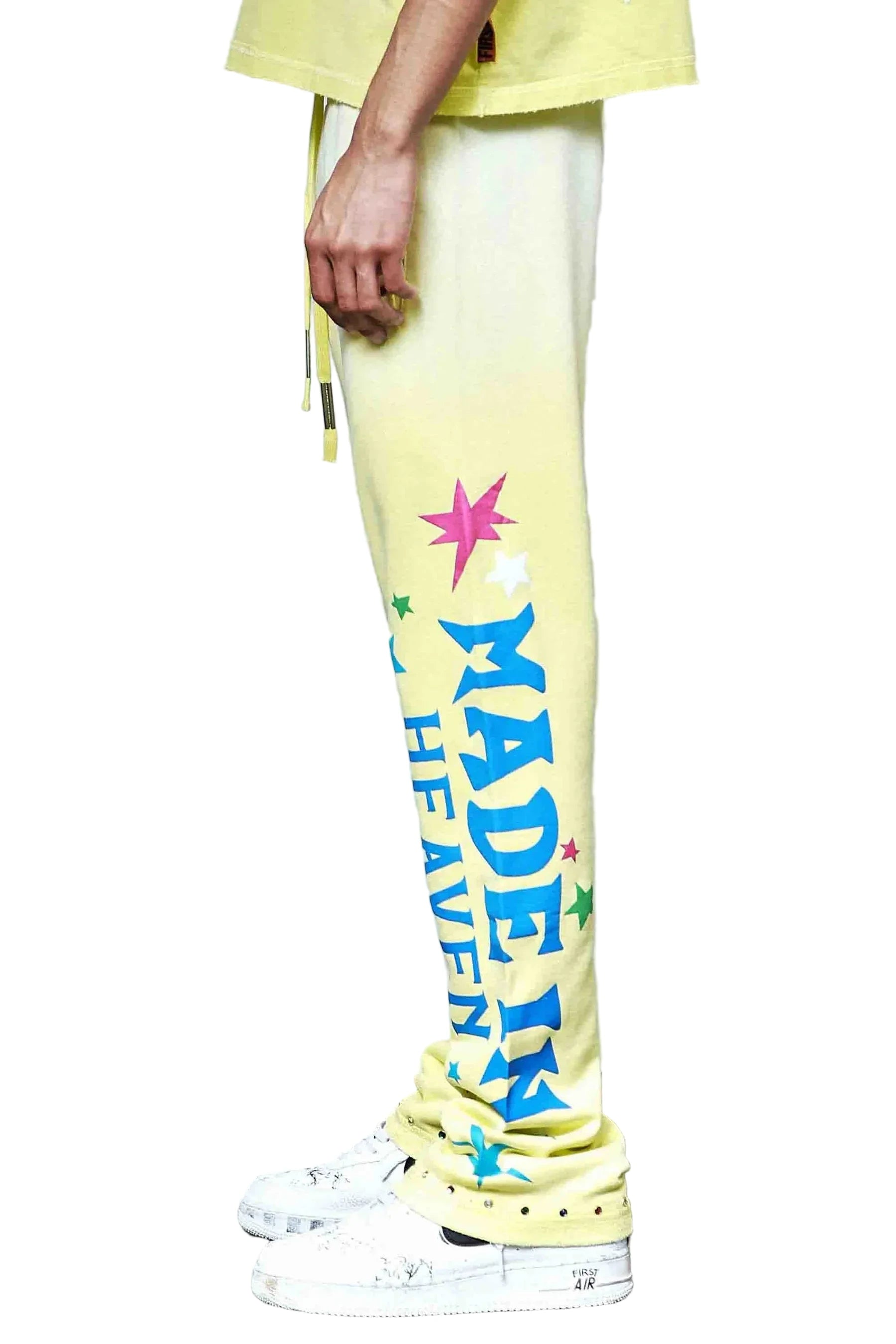 First Row MIH Konpeito Flare yellow stack jogger pants with jewel stud detailing and elastic drawcord waistband