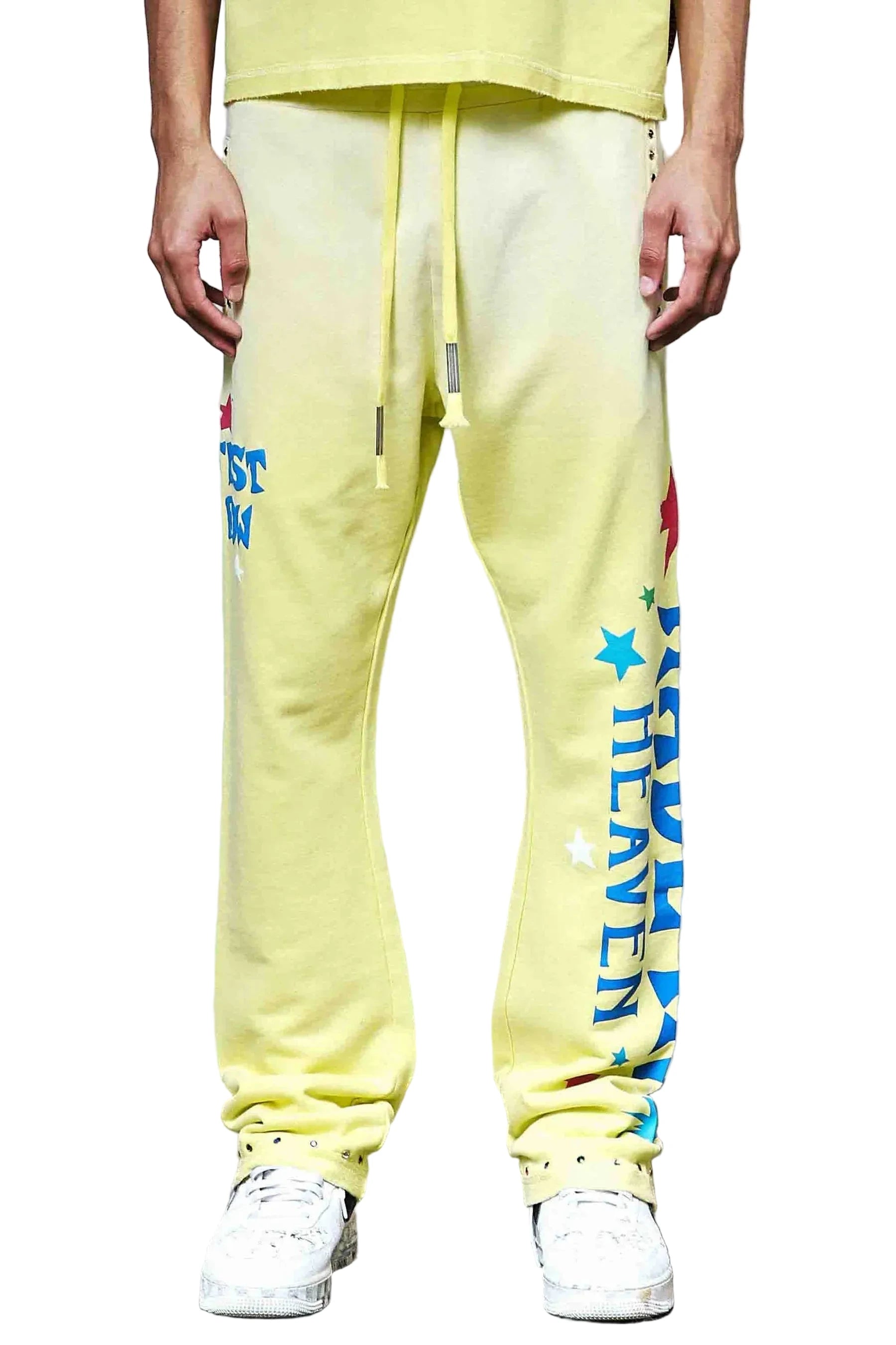 First Row MIH Konpeito Flare yellow stack jogger pants with jewel stud detailing and elastic drawcord waistband