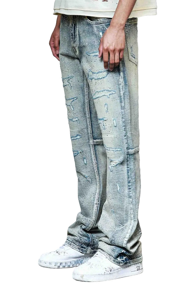 First Row allover rhinestone denim flare jeans with rip and repair detailing and classic 5-pocket construction