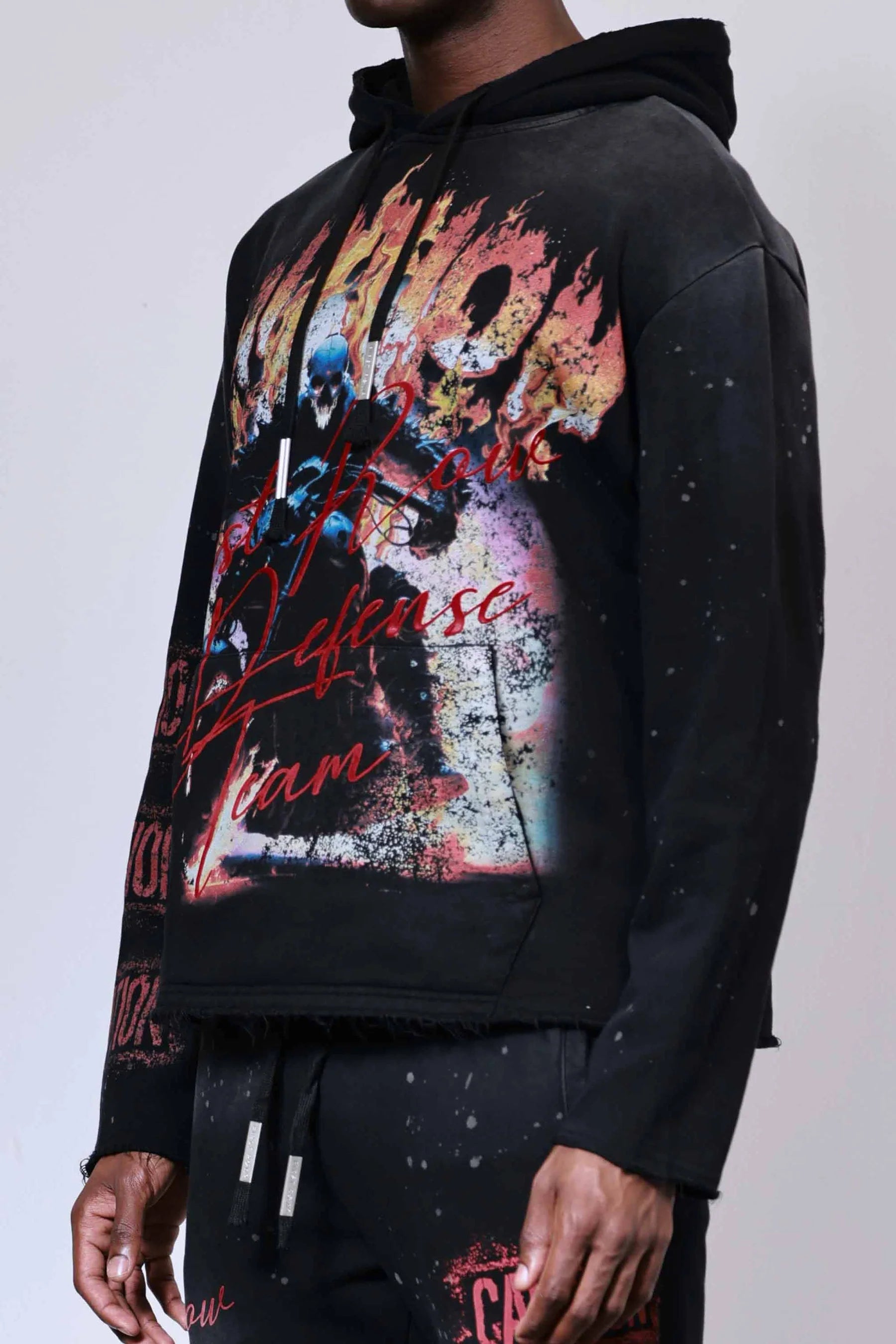 First Row Caution Not So Quiet Ghost Rider Flames open-bottom sweat hoodie with flock detailing, slightly oversized fit, raw edge hem, kanga pocket, and adjustable drawstring hood