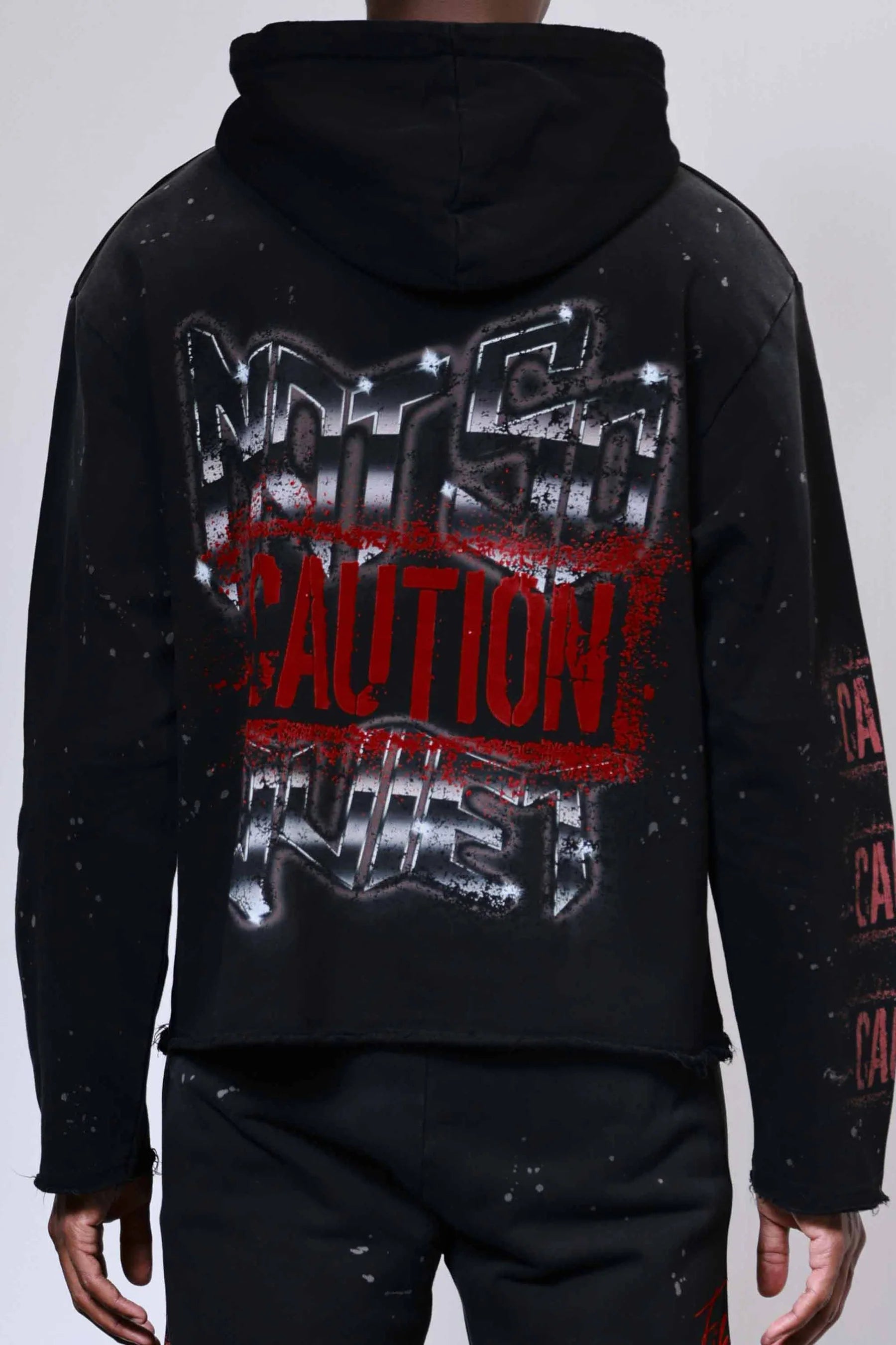 First Row Caution Not So Quiet Ghost Rider Flames open-bottom sweat hoodie with flock detailing, slightly oversized fit, raw edge hem, kanga pocket, and adjustable drawstring hood