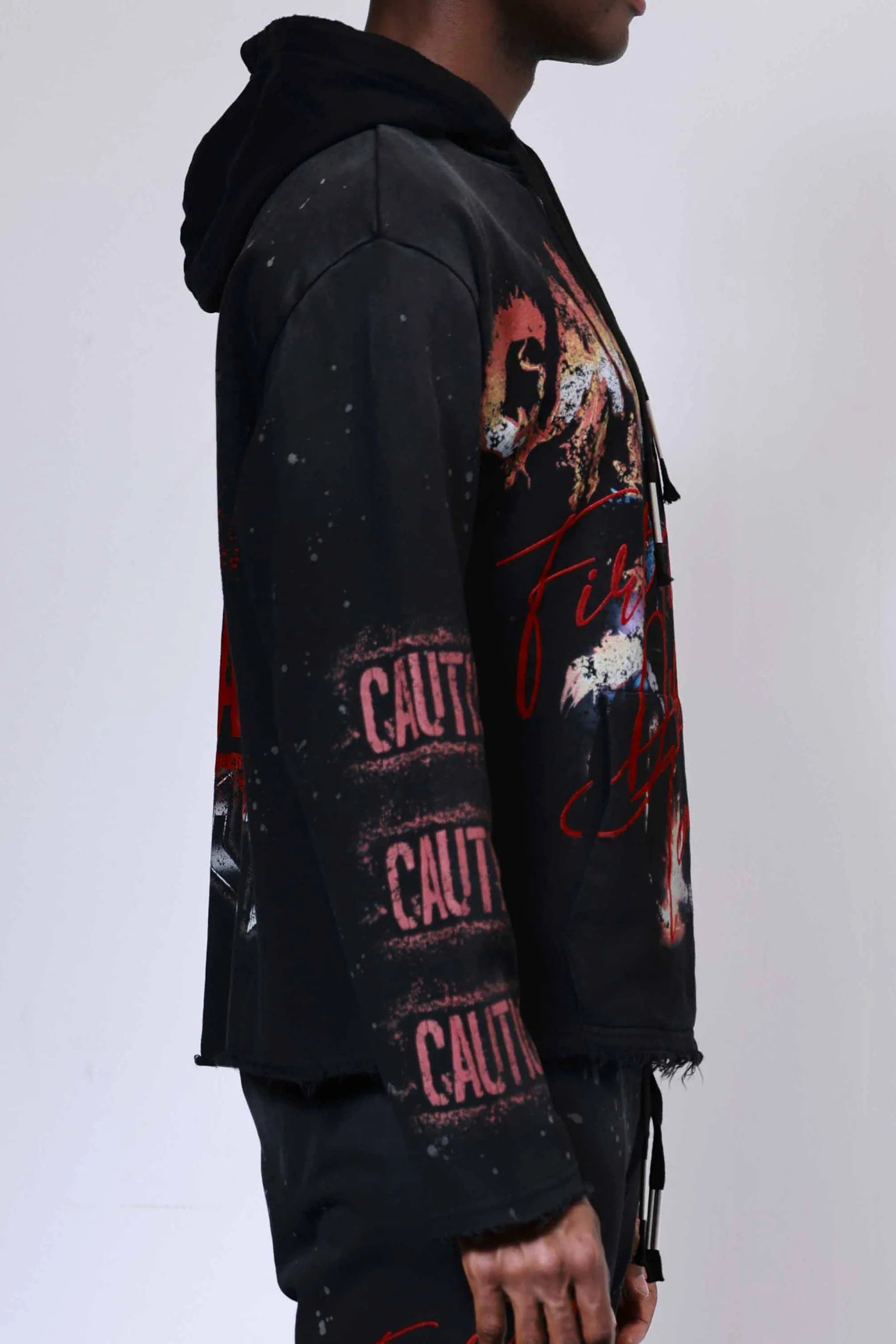 First Row Caution Not So Quiet Ghost Rider Flames open-bottom sweat hoodie with flock detailing, slightly oversized fit, raw edge hem, kanga pocket, and adjustable drawstring hood