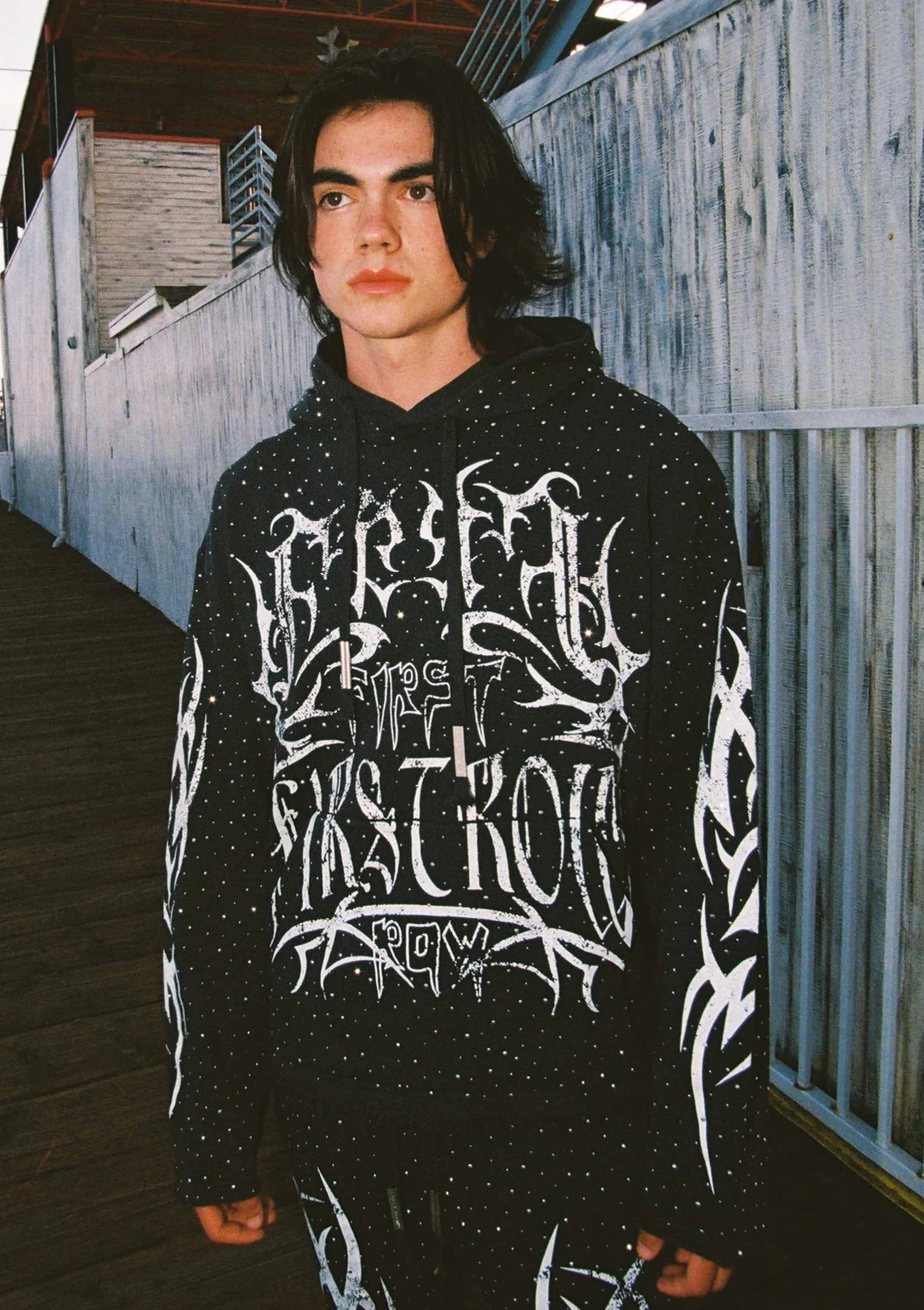 Grey First Row Y2k Tribal Allover Stud full-zip hoodie with applique embroidery, stone accents, bleach splash wash effect, drawstring hood, and front kanga pocket