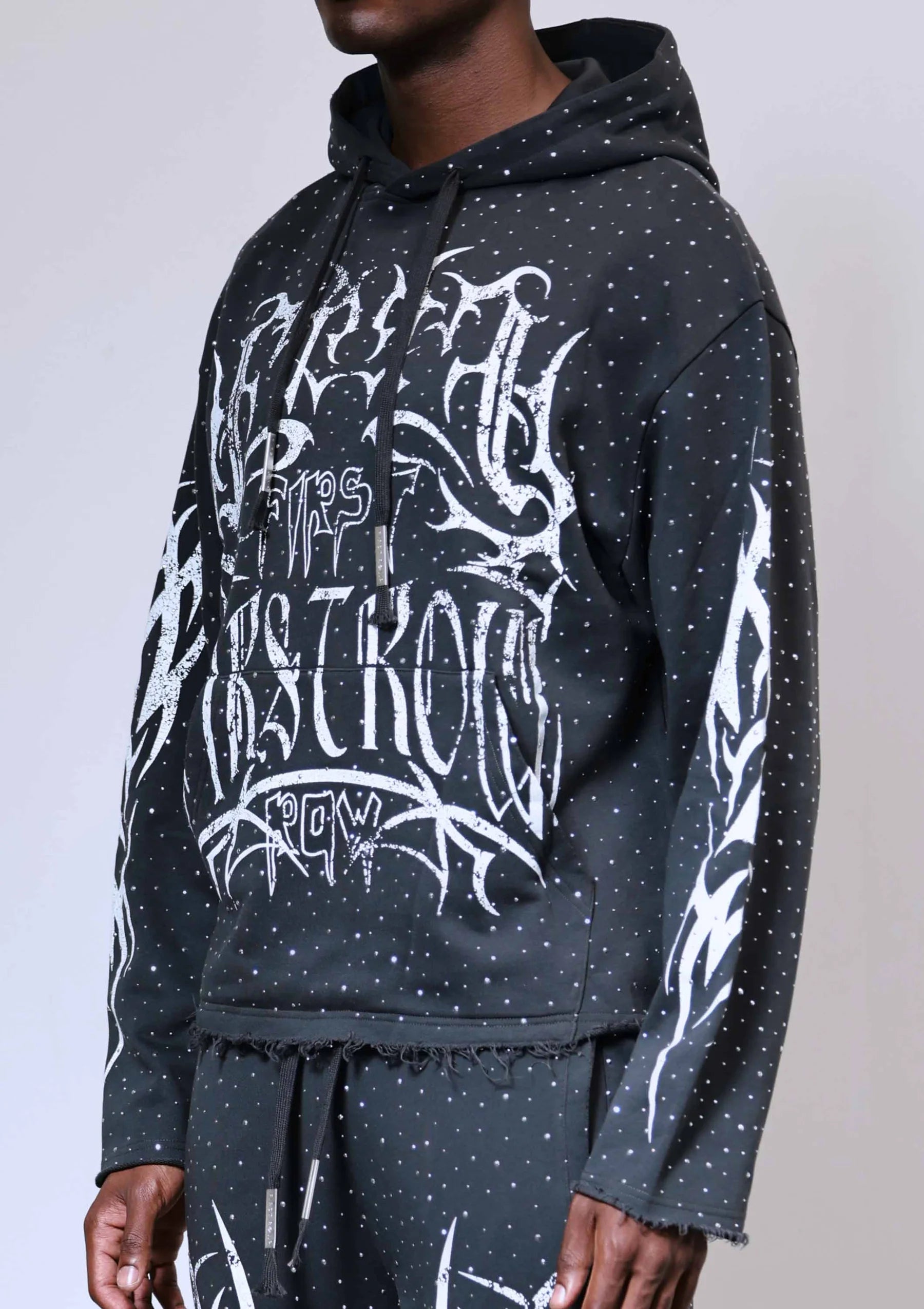 Grey First Row Y2k Tribal Allover Stud full-zip hoodie with applique embroidery, stone accents, bleach splash wash effect, drawstring hood, and front kanga pocket