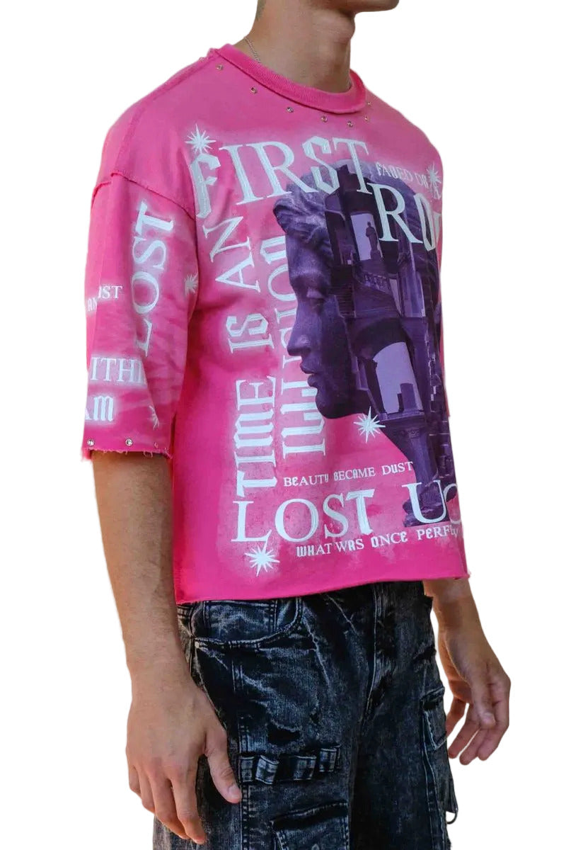 First Row FR Cropped Tee in pink mini terry fabric with rubber welding and stud detailing, raw edge hem, and ribbed neck