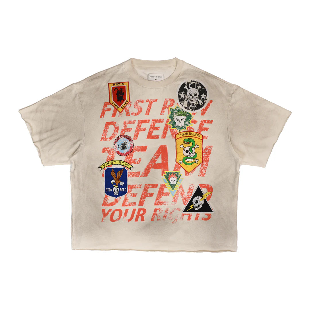 "First Row A washed crop mini terry t-shirt in 100% cotton, featuring a raw-edge hem and patch detail, styled in a relaxed cropped fit."