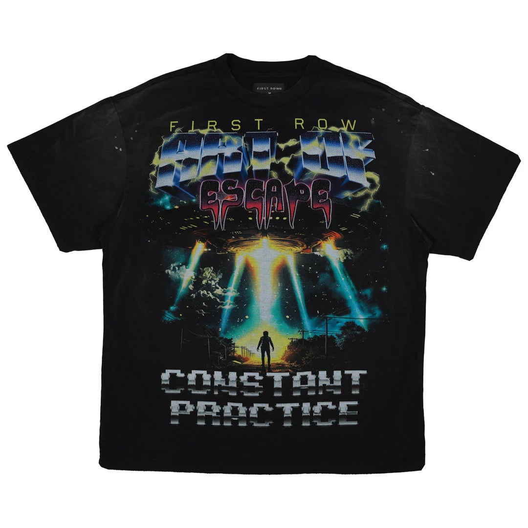 "First Row Art of Escape Tour Tee with heavy washed graphic, stone detail, and distressed hem."