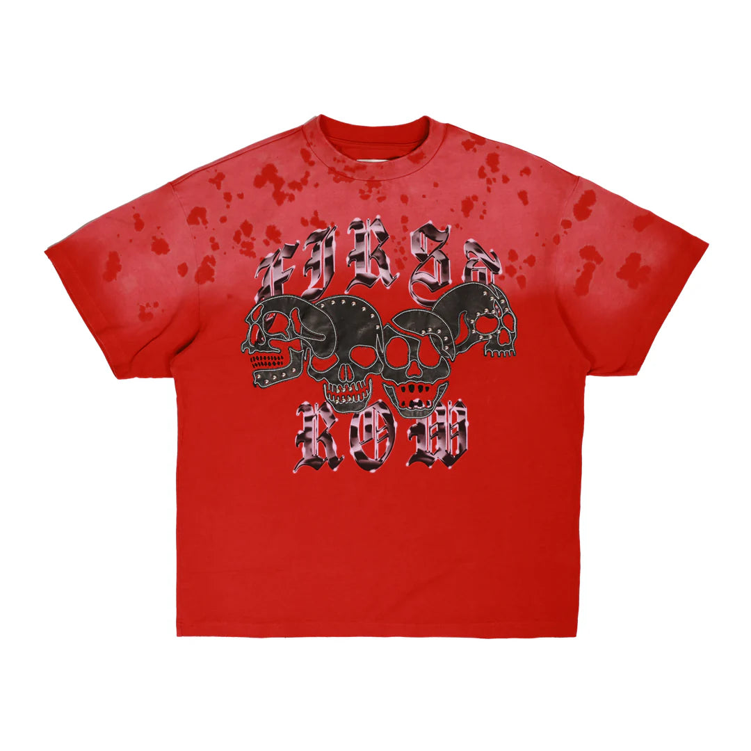 "First Row Wake Up And Be Fierce Applique Tee in red with applique embroidery, stud accents, and bleach splash wash effect."