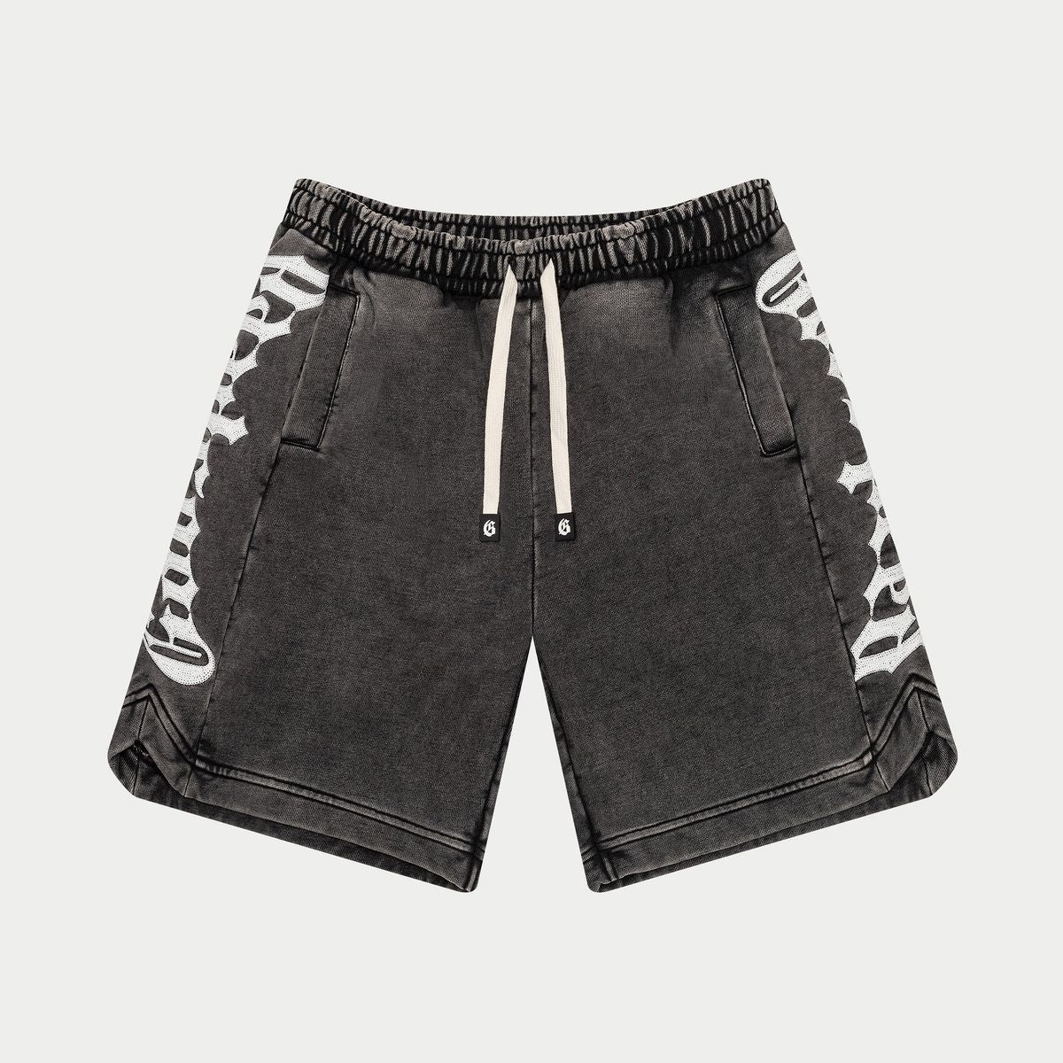 Black shorts with white patterns on a light gray background