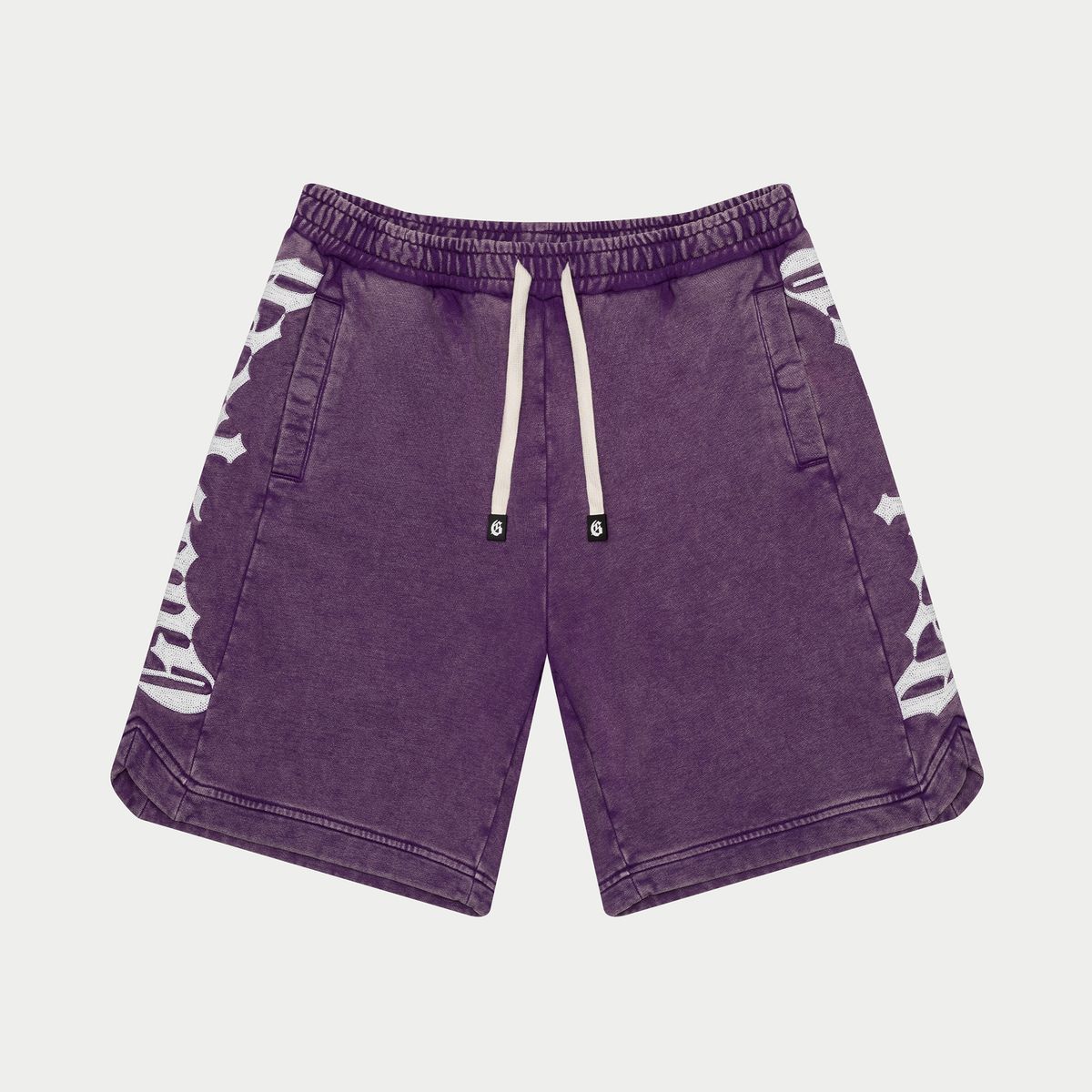 Purple shorts with white zebra pattern on a light gray background