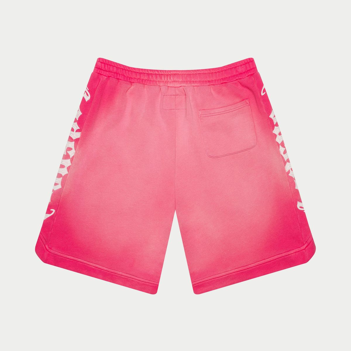 Pink shorts with white branding on a light gray background