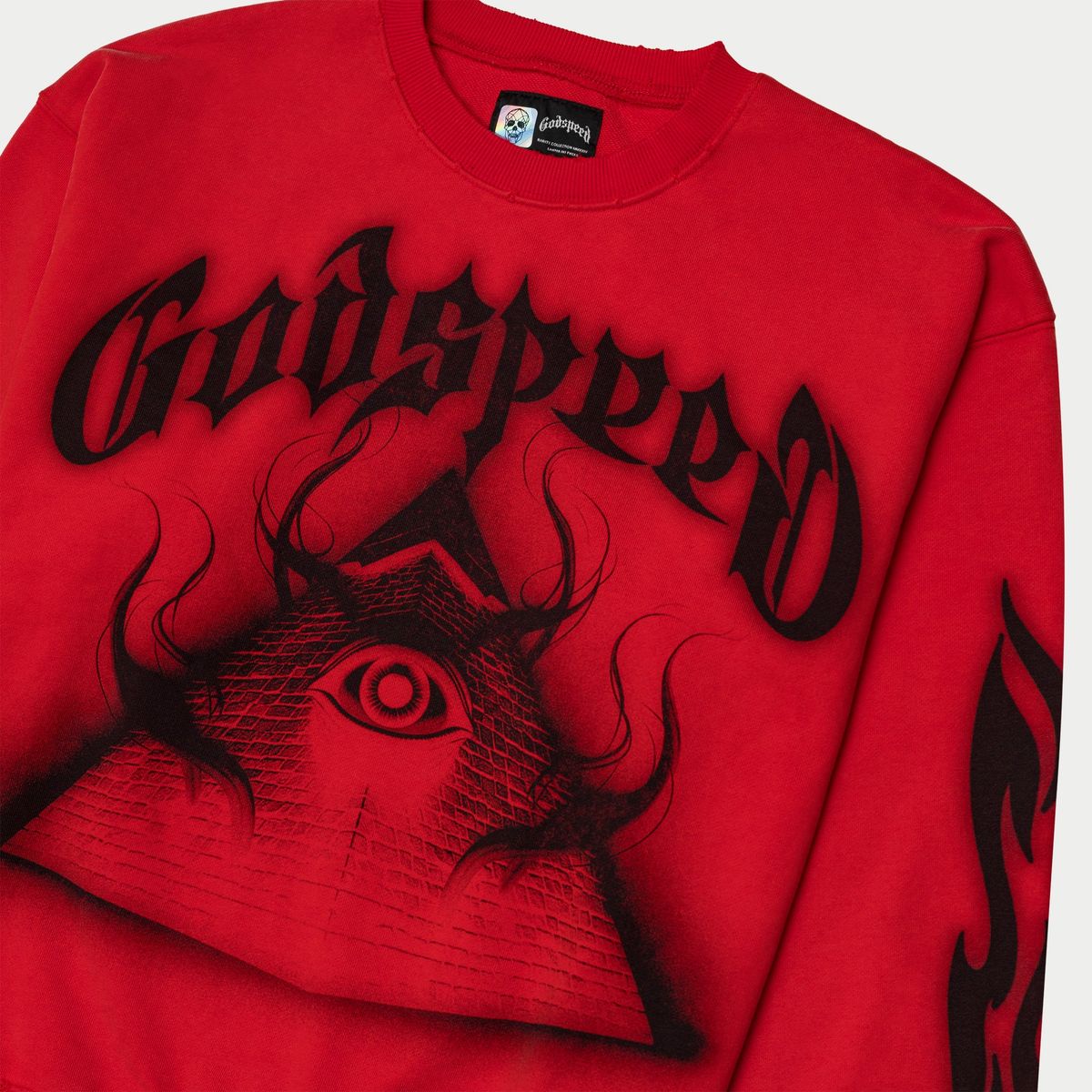 Red sweatshirt with black 'Godspeed' design on a white background