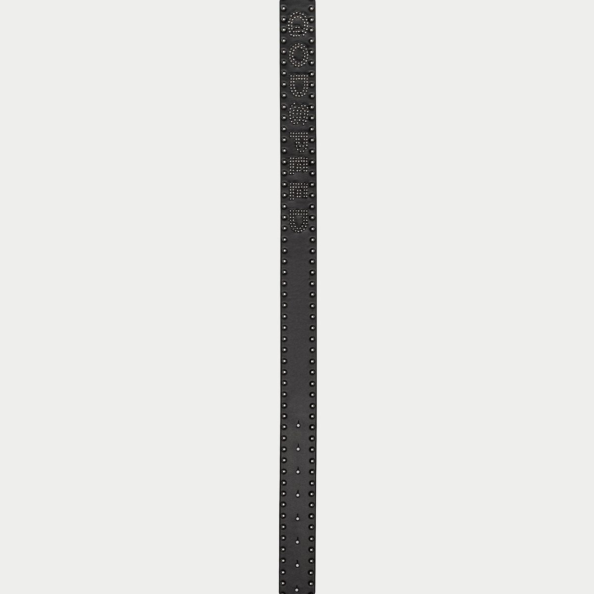 Black belt with decorative pattern on a light gray background