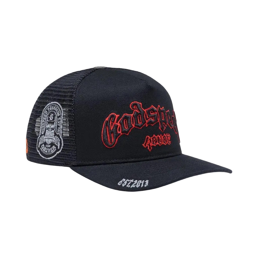 Godspeed GS Forever Trucker Hat in black and red featuring color-changing embroidery, mesh-back construction, collectible pin set, and limited-edition packaging.