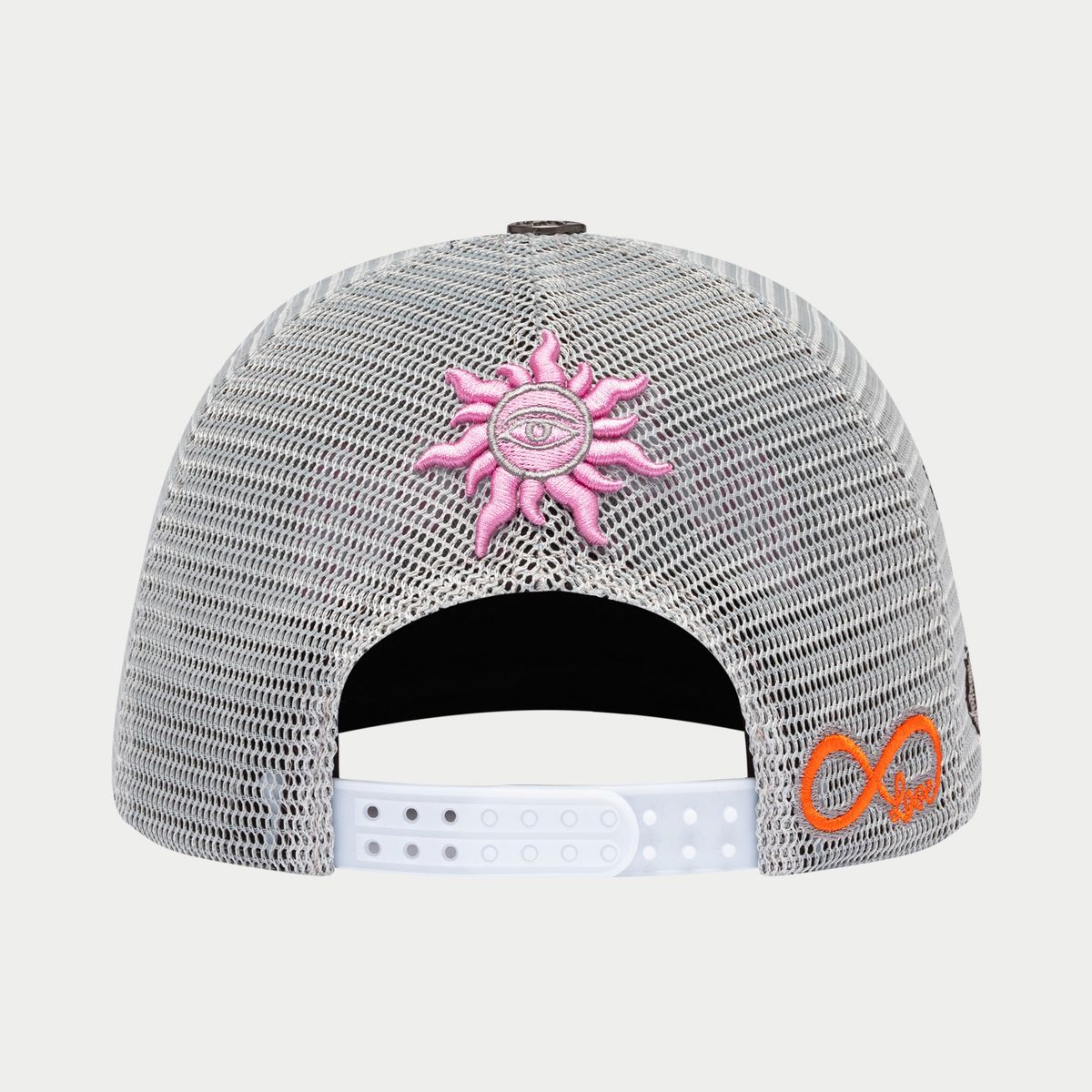 Gray mesh cap with pink sun design and orange logo on a light gray background