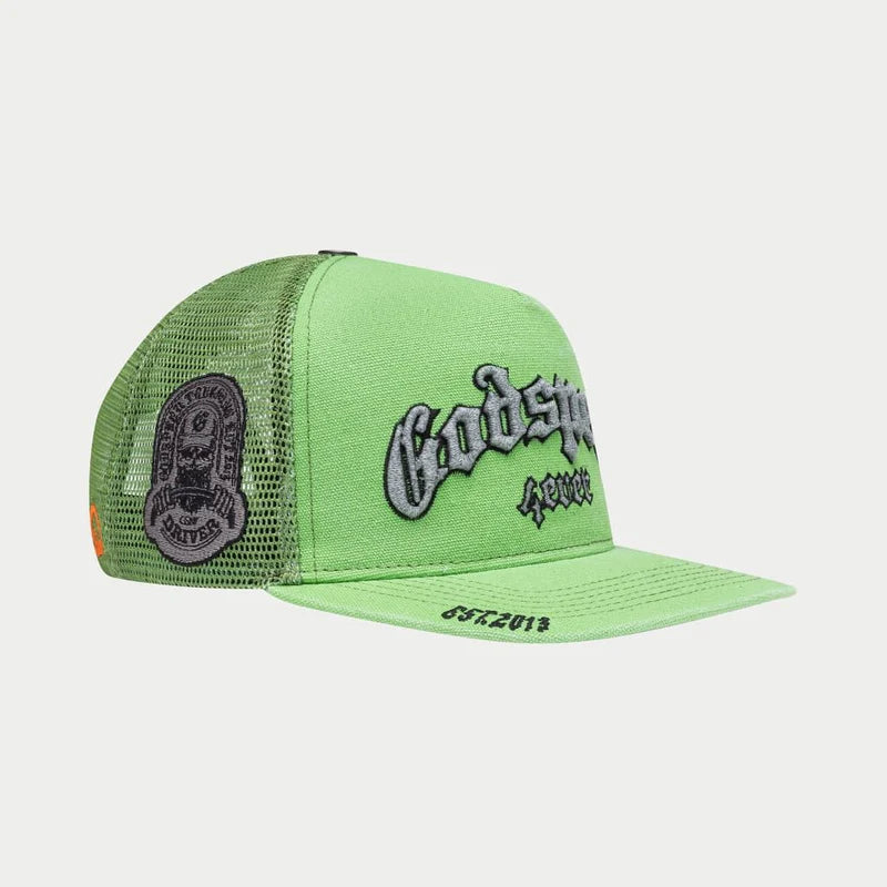 Godspeed 4ever Signature Trucker Hat titled "The Mother of All Truckers" featuring color-changing embroidery, limited edition box, and 3-piece pin set.