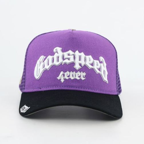 Godspeed GS Forever trucker hat in purple and black featuring color-changing embroidery, mesh-back construction, collectible pin set, and limited-edition packaging.