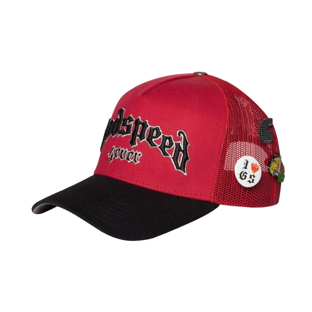 Godspeed GS Forever trucker hat in red and black featuring color-changing embroidery, mesh-back construction, collectible pin set, and limited-edition packaging.