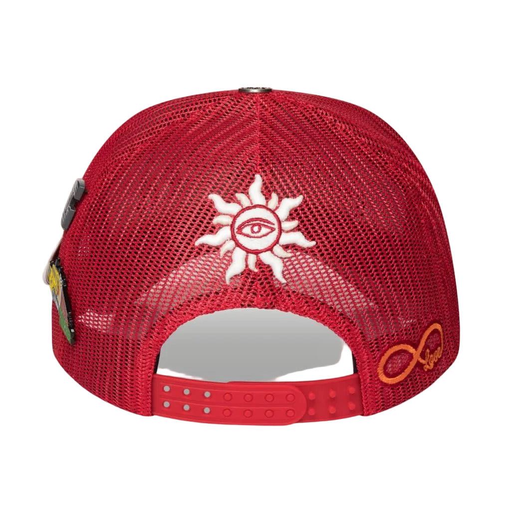 Godspeed GS Forever trucker hat in red and black featuring color-changing embroidery, mesh-back construction, collectible pin set, and limited-edition packaging.