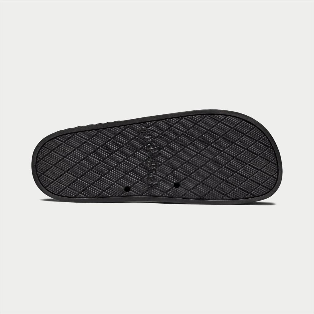 Black Godspeed OG Logo Slides featuring “DON’T BRING SAND TO THE BEACH” tagline with branded box and dust bag.