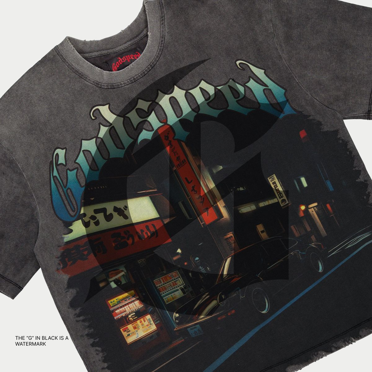Grey washed Godspeed Pit Stop Tokyo T-shirt featuring digital art graphic, oversized fit, and numbered tag from a limited 555-piece release.