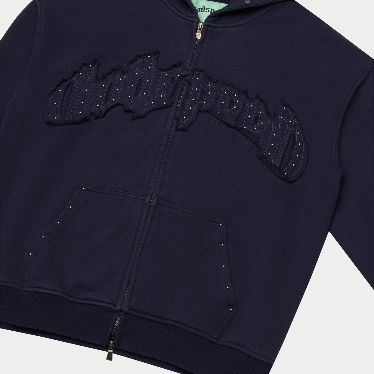 Navy Godspeed Symmetric Studded Sweat Set featuring studded applique logo, includes hoodie and sweatpants.