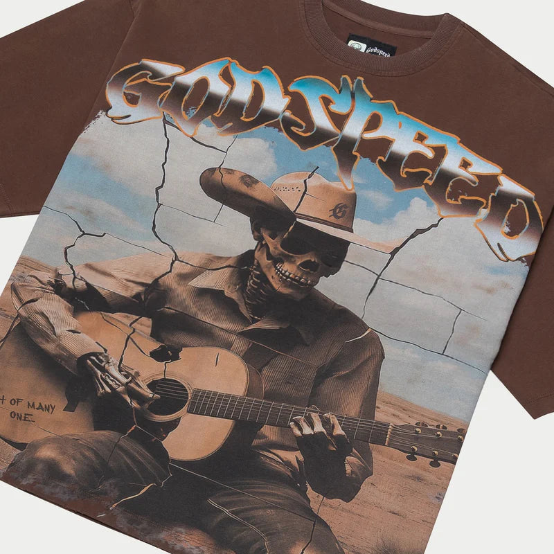 limited edition virtuoso t-shirt with bold artwork and stone-embellished crown on mid-weight washed fabric laid flat