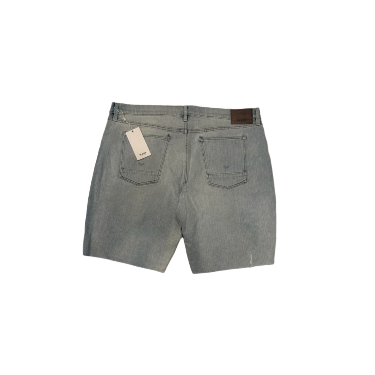 Gray denim shorts with a tag on a white background
