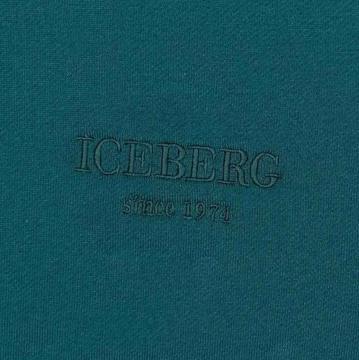 Refresh your wardrobe with the Embroidered Logo Sweatshirt (Teal) — a premium blend of comfort, color, and minimalist designer detail