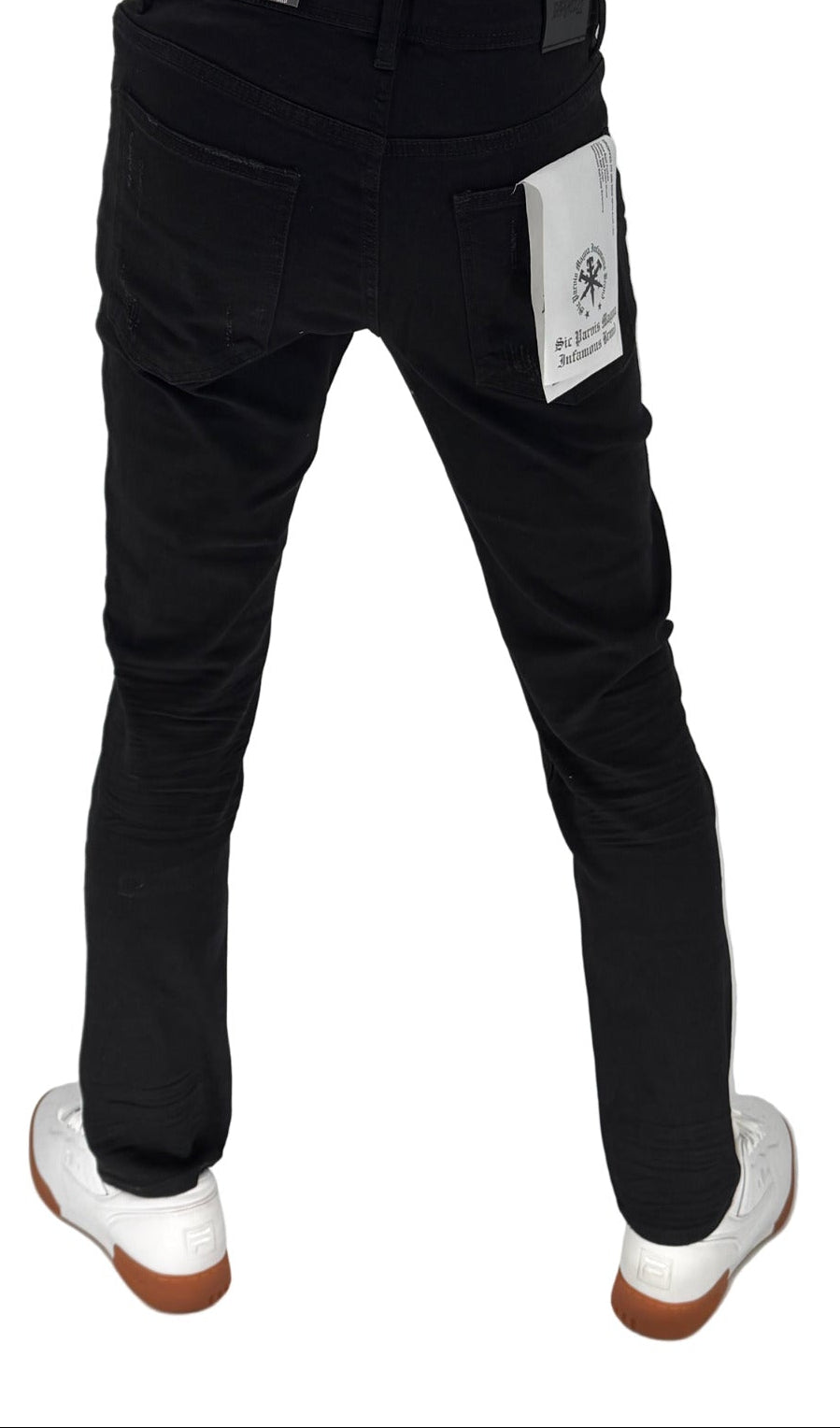 Step up your streetwear game with the Infamous Skinny Straight Jeans in Jet Black – the ultimate fusion of comfort, edge, and everyday style. These jeans are designed with a tailored skinny-straight fit that contours to your body without feeling restrictive. The deep jet black wash offers a clean, modern aesthetic that's perfect for day-to-night transitions.