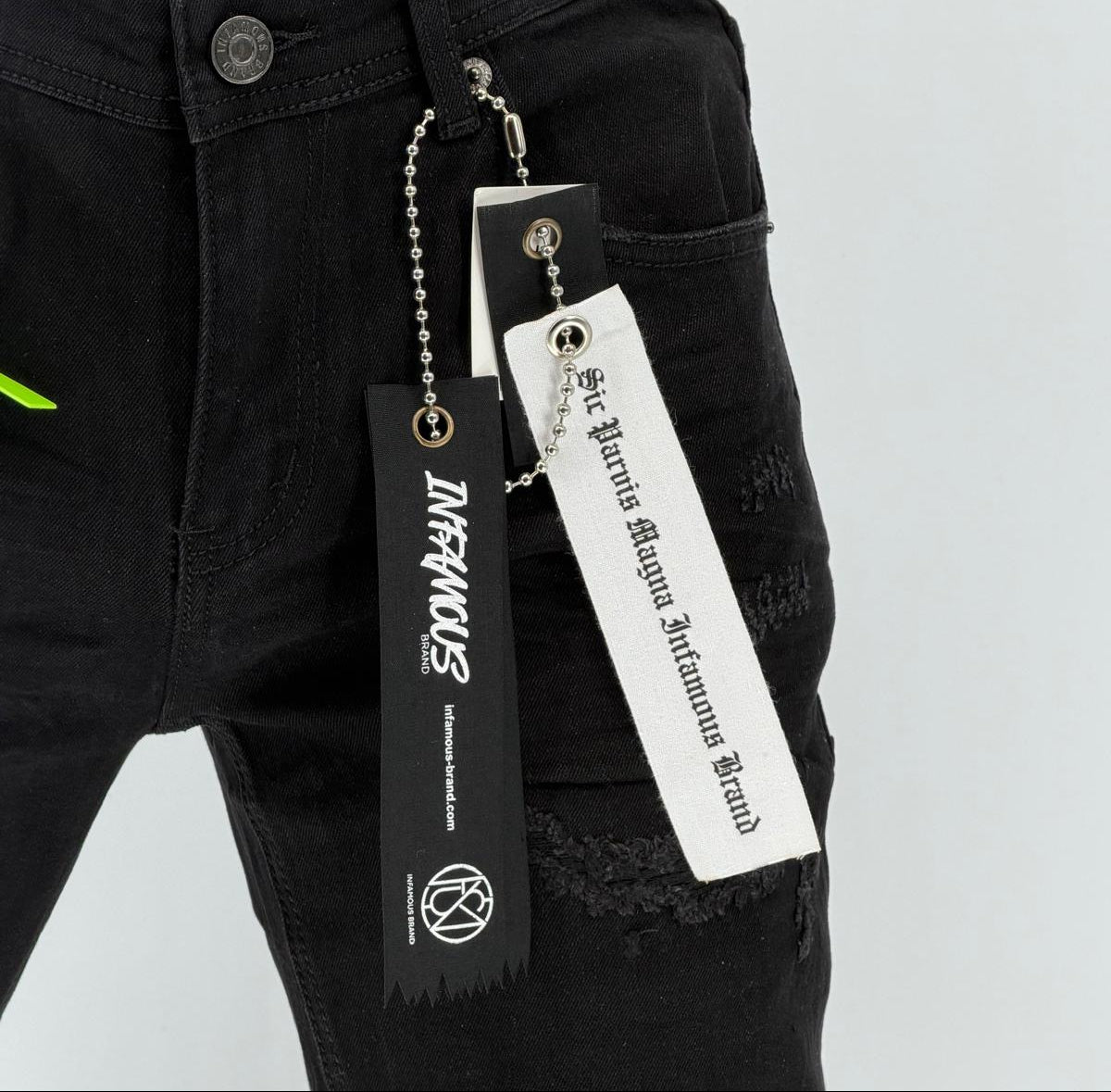 Step up your streetwear game with the Infamous Skinny Straight Jeans in Jet Black – the ultimate fusion of comfort, edge, and everyday style. These jeans are designed with a tailored skinny-straight fit that contours to your body without feeling restrictive. The deep jet black wash offers a clean, modern aesthetic that's perfect for day-to-night transitions.