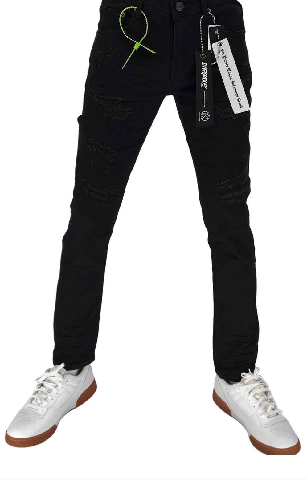Step up your streetwear game with the Infamous Skinny Straight Jeans in Jet Black – the ultimate fusion of comfort, edge, and everyday style. These jeans are designed with a tailored skinny-straight fit that contours to your body without feeling restrictive. The deep jet black wash offers a clean, modern aesthetic that's perfect for day-to-night transitions.